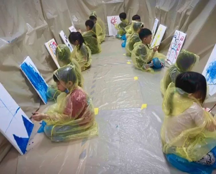 Children doing splat art